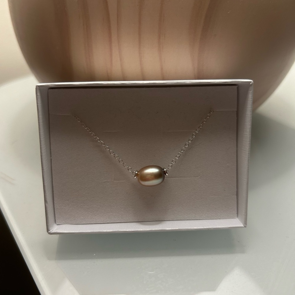 Blue floating pearl necklace